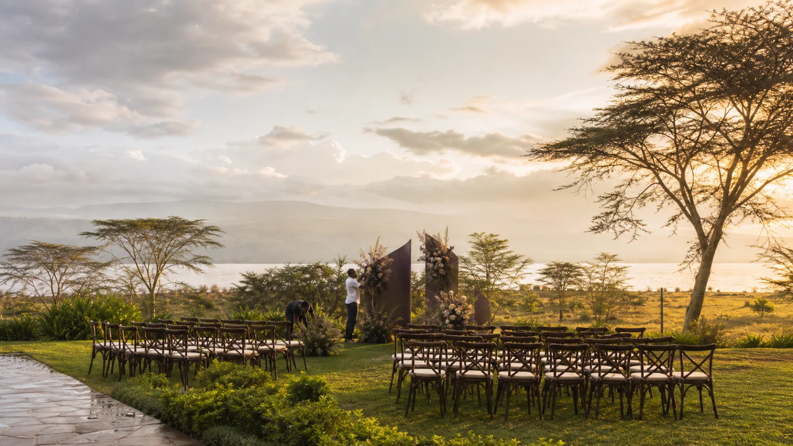 A lakeside Kenyan wedding ceremony setting at golden hour
